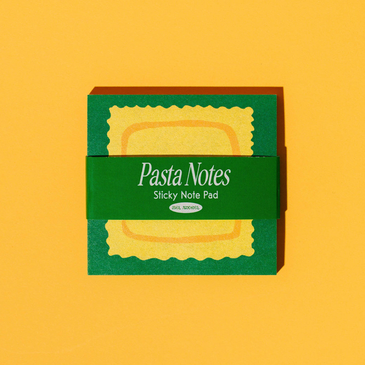 Pasta-shaped sticky notes with a green box on a yellow background