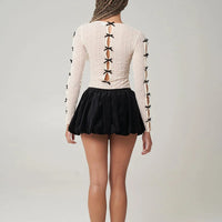 Ross Bow Mockneck Top in Cream with Black Bows