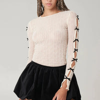 Ross Bow Mockneck Top in Cream with Black Bows