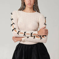 Ross Bow Mockneck Top in Cream with Black Bows